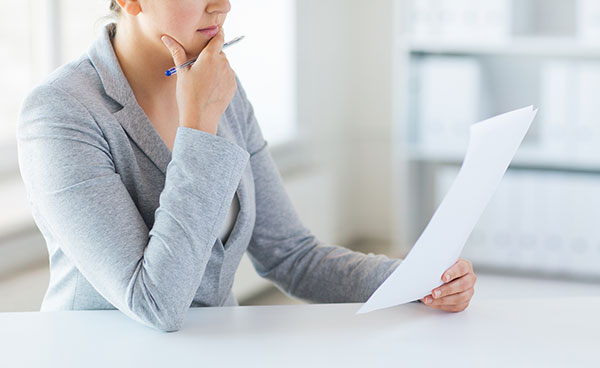 woman reading document